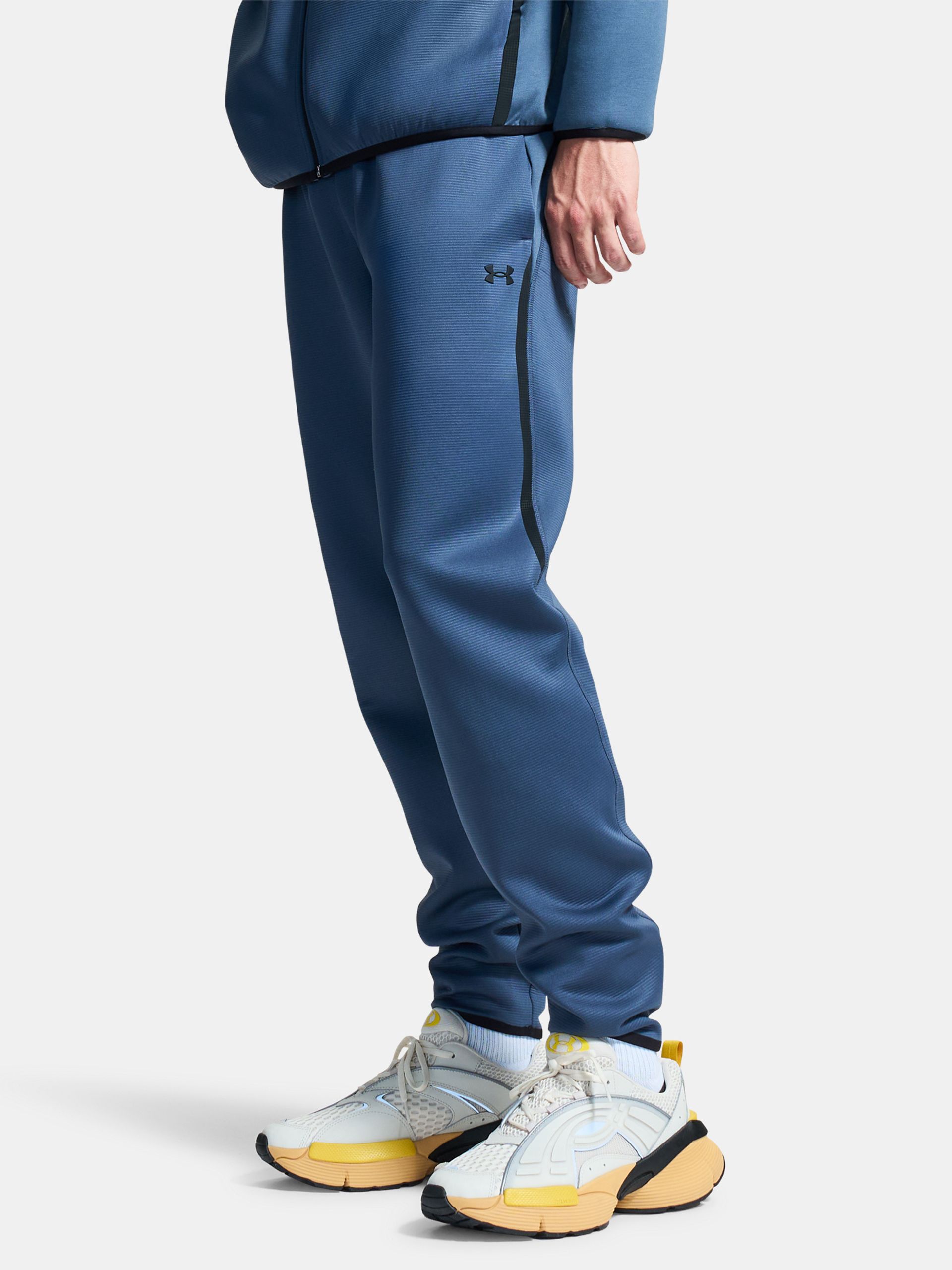 Moške spodnji del trenirke Under Armour UA Unstoppable Flc Txtrd Jgr - 001