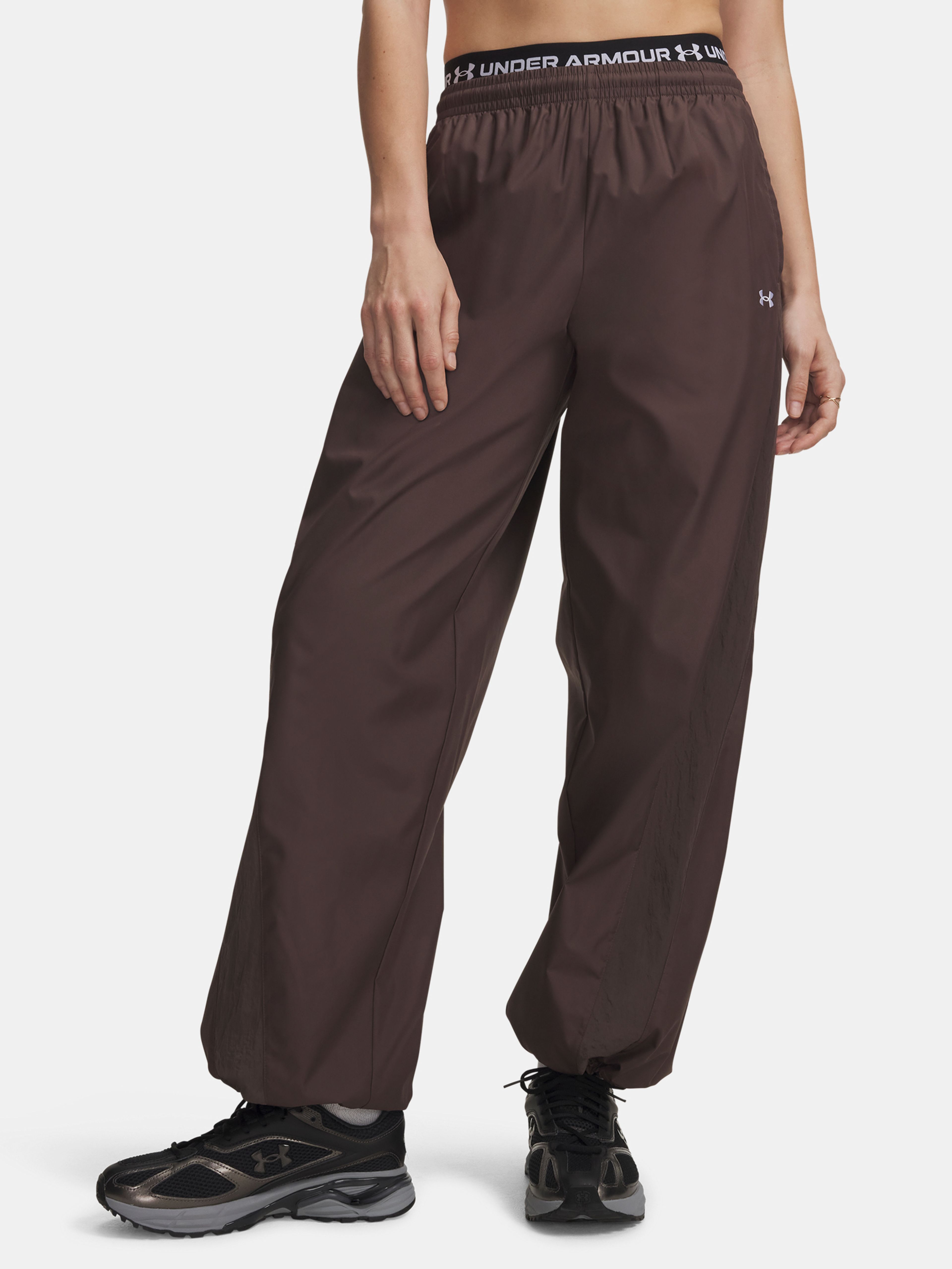 Naiste spordipüksid Under Armour Icon Woven Pant - 001