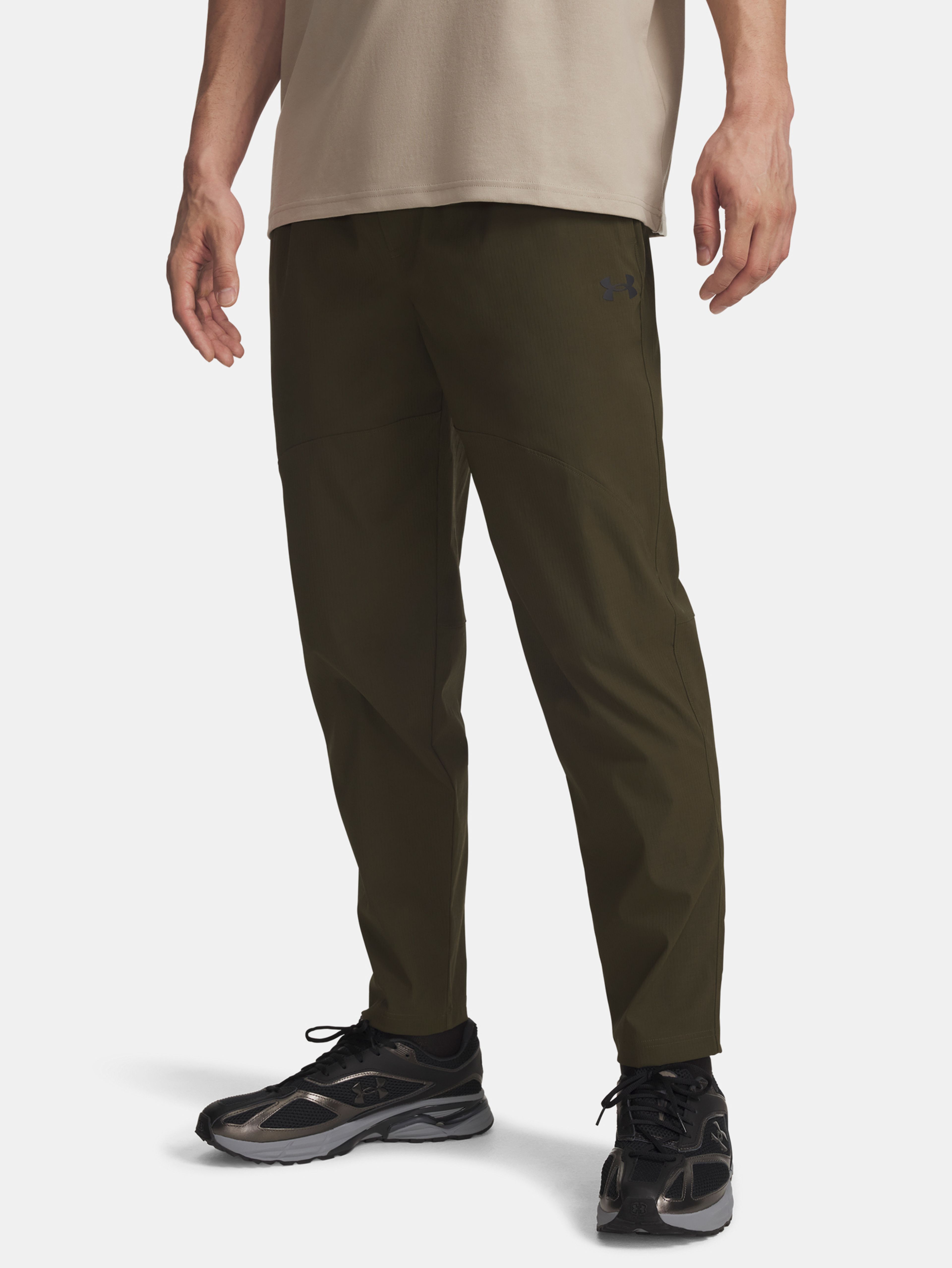 Pánské sportovní kalhoty Under Armour UA UNSTPBLE WOVEN TX TAPER-GRN